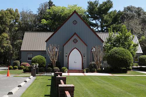 outdoors church surrounded by green plants bluffton
